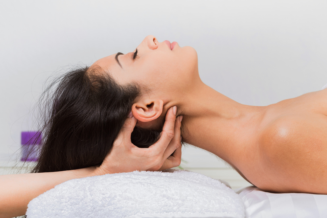 Beautician doctor make neck massage in spa wellness center